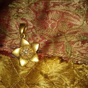 My grandma's pendant the gold has never been tested